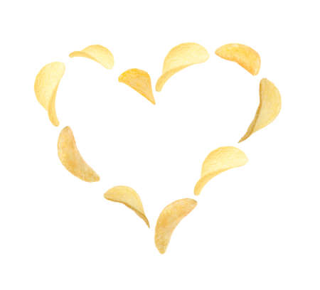 Heart made of tasty potato chips on white backgroundの写真素材