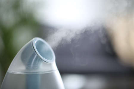 Modern air humidifier indoors, closeup. Space for textの写真素材