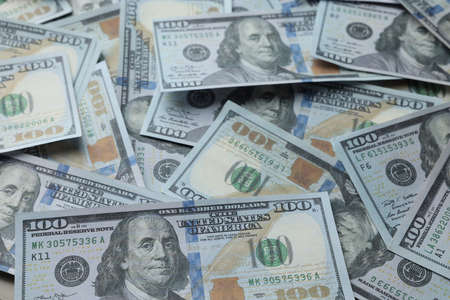 Dollar banknotes as background, closeup view. money exchange