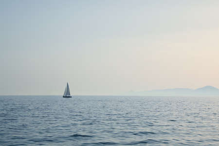 Beautiful view of the yacht in the sea on a sunny day