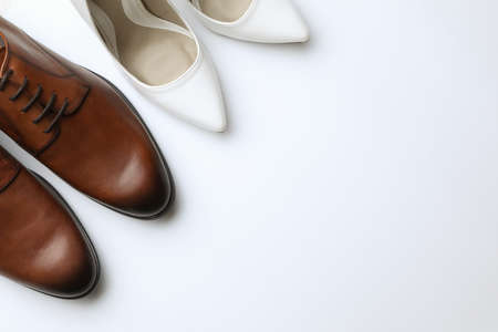 Wedding shoes for bride and groom on white background, top viewの写真素材