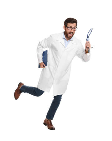 Doctor with stethoscope and clipboard running on white backgroundの写真素材