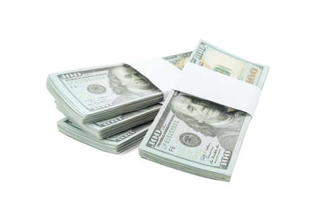 Bundles of dollar banknotes isolated on white. american national currency