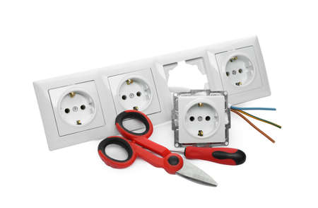 Set of sockets and electrician's tools isolated on white