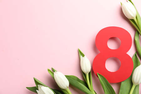 8 March card design with tulips and space for text on pink background, flat lay. International...