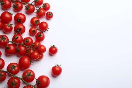 Fresh cherry tomatoes on white background, top viewの写真素材