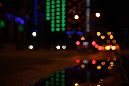 Blurred view of cityscape with bokeh effect. night life