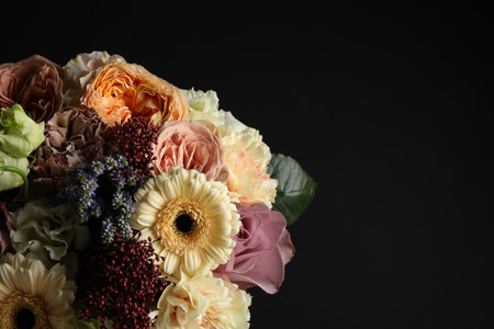 Bouquet of beautiful flowers on black backgroundの写真素材