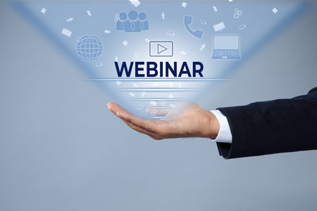 webinar concept. Close up view of man and different virtual icons on light gray backgroundの写真素材