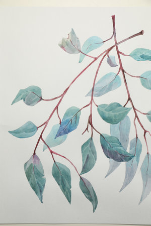Beautiful watercolor tropical leaves painted on white paper, top viewの写真素材