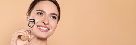 Woman with eyelash curler on beige background, space for text. banner design