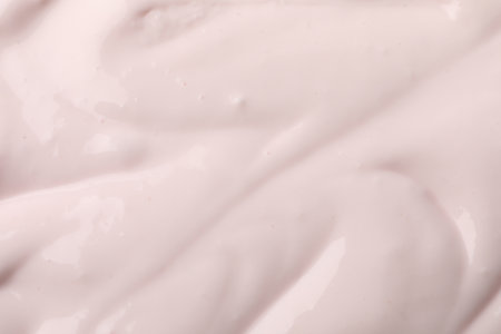 Tasty organic yogurt as background, top view