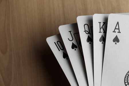 Playing cards with royal flush combination, closeup. Space for textの写真素材