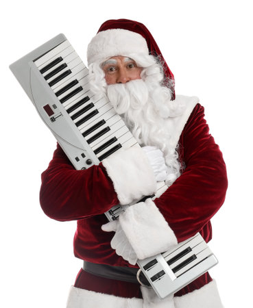 Santa Claus with synthesizer on white background. christmas musicの写真素材