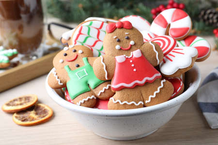 Delicious Christmas cookies on wooden table, closeup