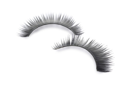 Fake eyelashes on white background. makeup product