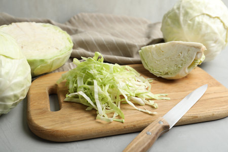 Fresh shredded cabbage on gray table, closeupの写真素材