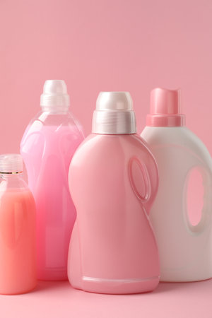 Bottles of laundry detergents on pink backgroundの写真素材