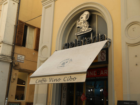 JESI, ITALY - MAY 17, 2022: Entrance of cafe with canopy on city streetのeditorial素材