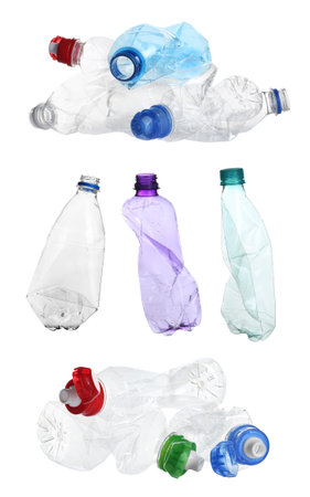 Set with empty crumpled bottles on white backgroundの写真素材