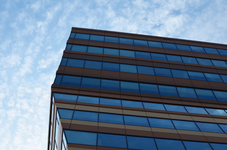 Modern building against blue sky, low angle view