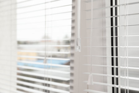 Closeup view of stylish horizontal window blindsの写真素材