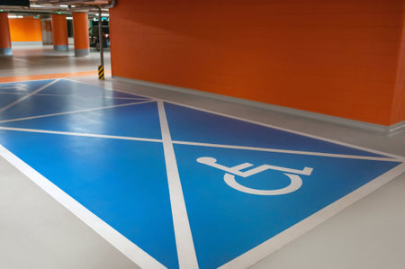 Empty car parking garage with wheelchair symbolの写真素材