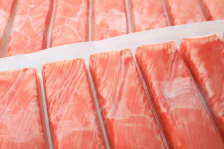 Closeup view on packs of fresh crab sticks