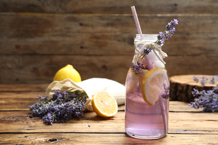 Fresh delicious lemonade with lavender on wooden tableの写真素材