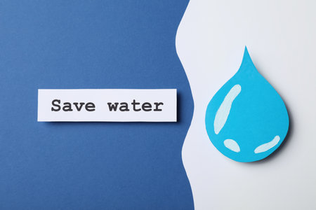 Card with words Save Water and drop on color background, flat layの写真素材
