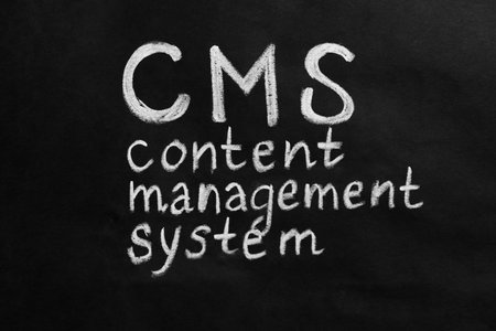 Abbreviation CMS (Content Management System) on black backgroundの写真素材