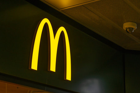 WARSAW, POLAND - AUGUST 05, 2022: Signboard with McDonald's Restaurant logoのeditorial素材