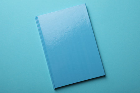 New bright planner on light blue background, top viewの写真素材