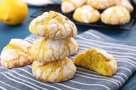 Tasty homemade lemon cookies on blue table, closeupの写真素材