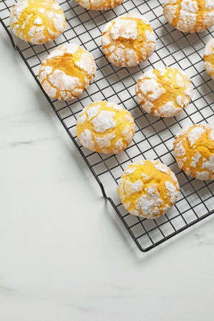 Tasty homemade lemon cookies on white marble table, above viewの写真素材