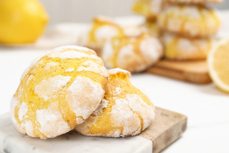 Tasty homemade lemon cookies on white table, closeup. Space for textの写真素材