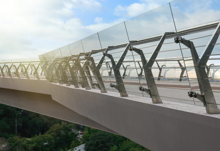 KYIV, UKRAINE - AUGUST 11, 2022: Pedestrian park bridge over Dnipro river