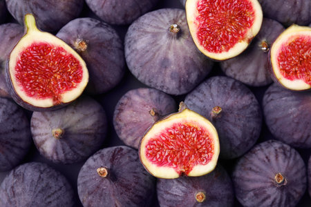 Fresh ripe figs as background, top viewの写真素材