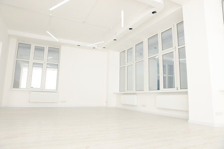 Modern office room with white walls and windows. interior designの写真素材