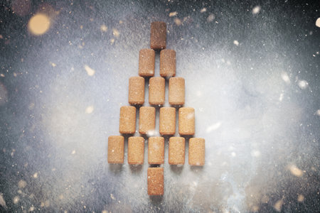 Christmas tree made of wine corks on light gray table, top viewの写真素材