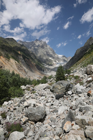 picturesque view of mountains under cloudy skyの写真素材
