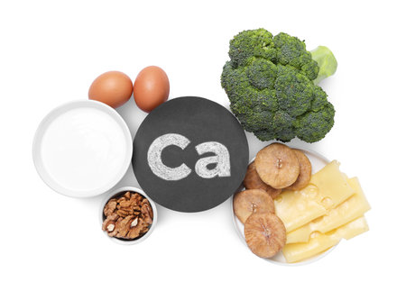 Set of natural food high in calcium on white background, top viewの写真素材