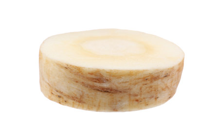 Piece of fresh parsnip isolated on whiteの写真素材