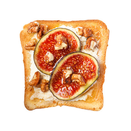 Delicious toast with cream cheese, sliced figs and nuts isolated on white, top viewの写真素材