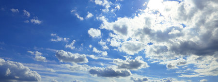 Beautiful blue sky with white fluffy clouds. banner design