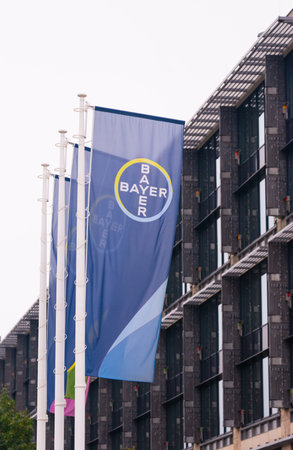 Warsaw, Poland - September 10, 2022: Beautiful modern Bayer logos on flagsのeditorial素材