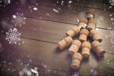 Christmas tree made of sparkling wine corks on wooden table. Space for textの写真素材