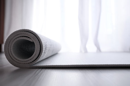 Karemat or fitness mat on wooden floor, closeupの写真素材