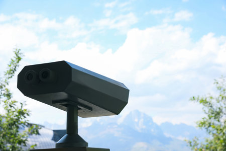 Metal tower viewer installed outdoors, closeup. Space for textの写真素材