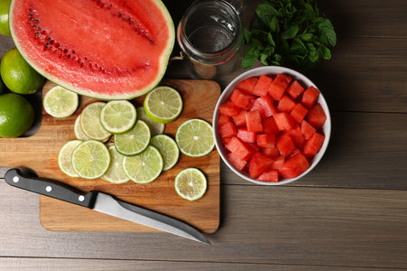 Fresh ingredients for making watermelon drink with lime on wooden table, above viewの写真素材